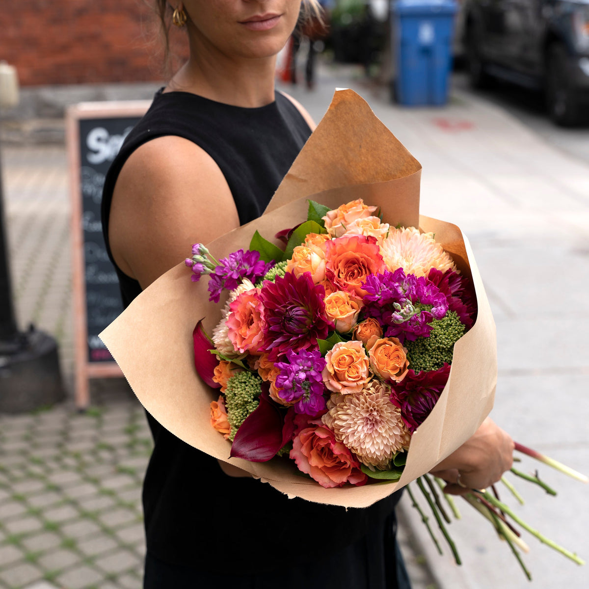 Girl holding flowers