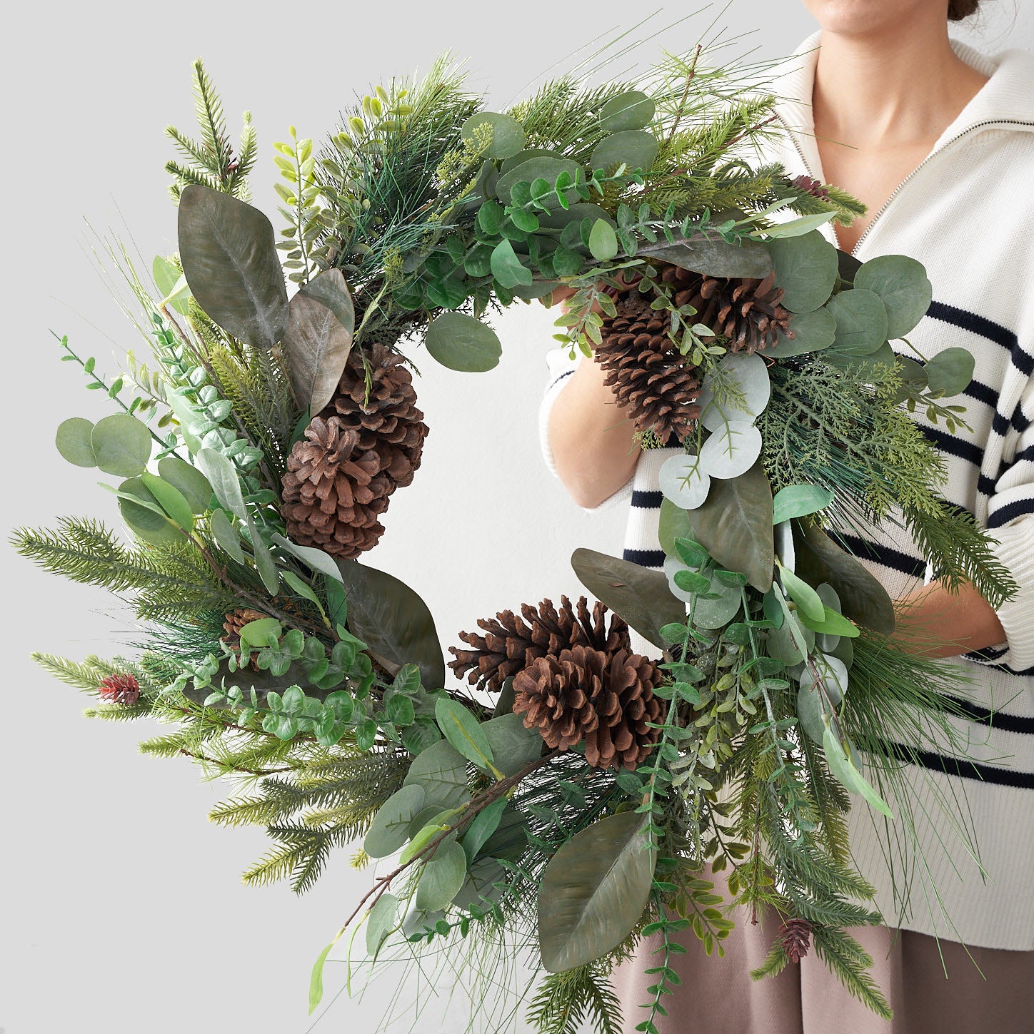 faux eucalyptus wreath with pine cones , balsam and cedar greens 