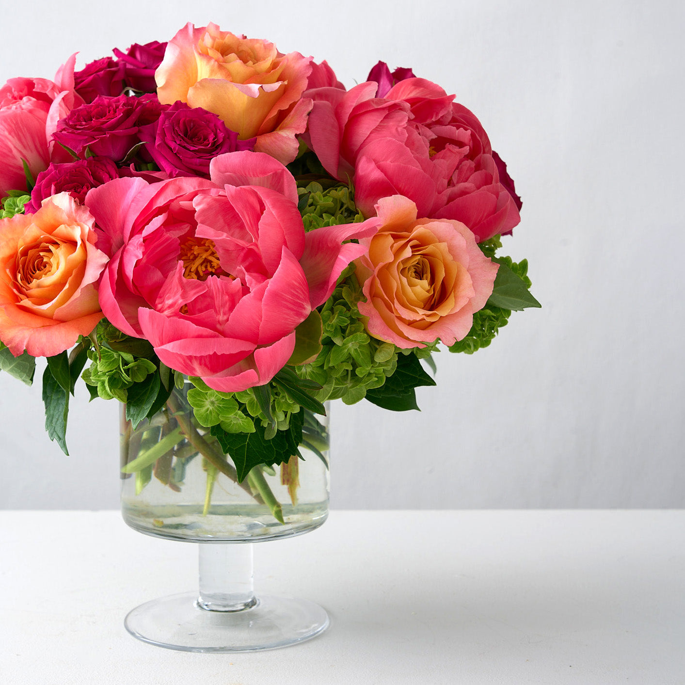 Side view of Eva arrangement in a clear glass vase